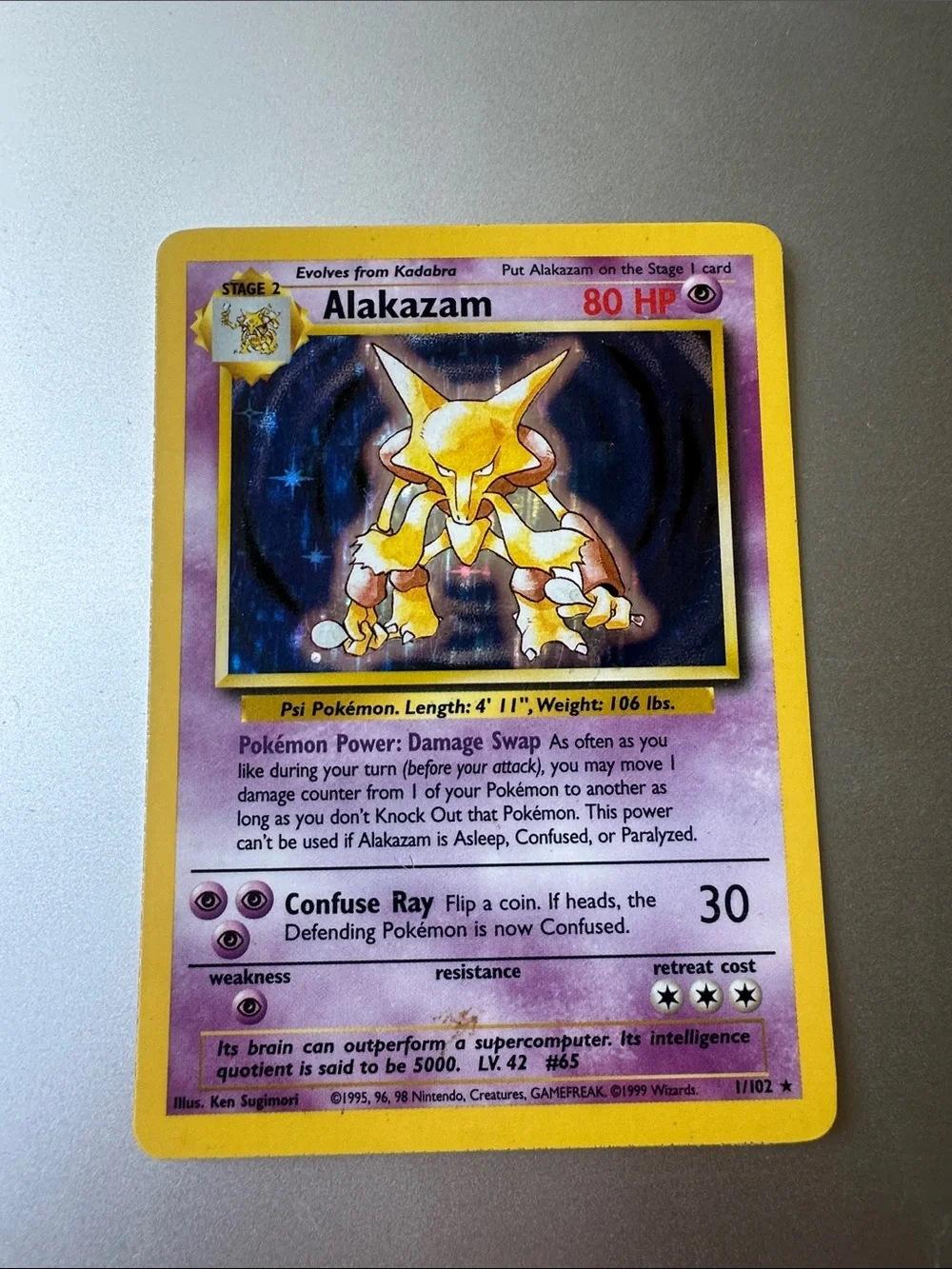 Alakazam Holofoil Pokémon Card (1/102)
